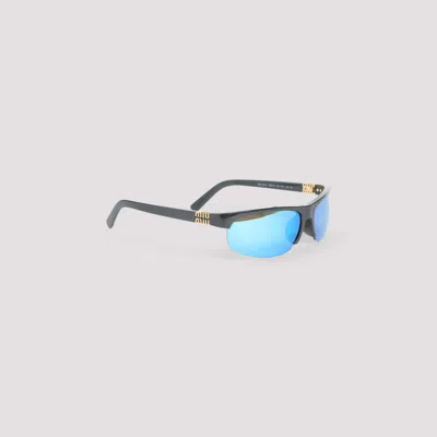 Miu Miu Runway Oval Sunglasses In Black