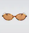Miu Miu Oval Sunglasses In Braun