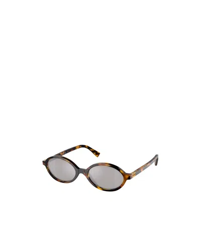 Miu Miu Oval Sunglasses In Gray