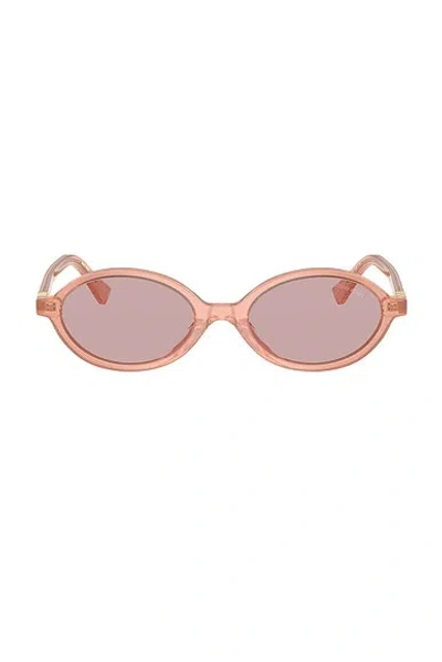 Miu Miu Oval Sunglasses In Orange