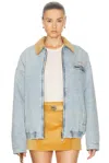 Miu Miu Denim Jacket With Logo In Azzurro