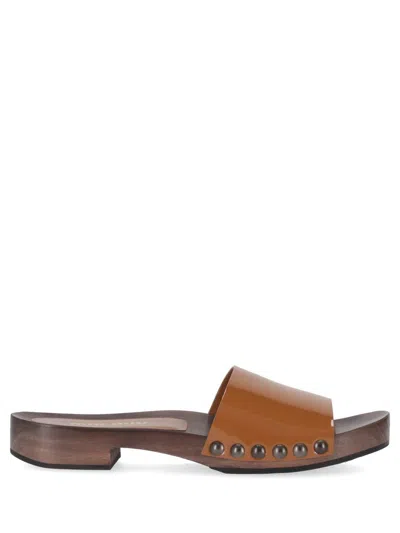 Miu Miu Patent Leather Clogs In Brown