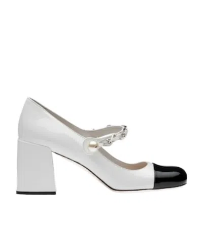 MIU MIU PATENT LEATHER PUMPS