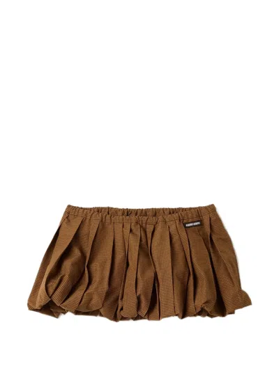 Miu Miu Pleated Mini Skirt With Embroidered Logo Patch In Black