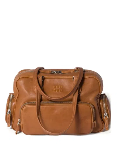 Miu Miu Pocket Leather Zipped Tote Bag In Brown