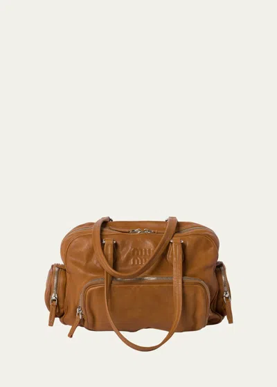 Miu Miu Pocket Washed Leather Shoulder Bag In F098l Caramel
