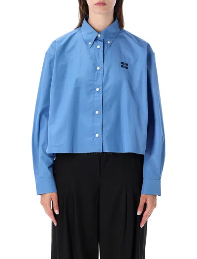 Miu Miu Poplin Boxy Shirt With Raw-cut Hem And Embroidered Logo In Blue