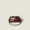 Miu Miu Python-print Ayers Leather Clutch In Brown