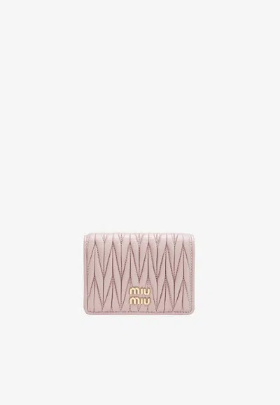 Miu Miu Quilted Compact Wallet In Pink