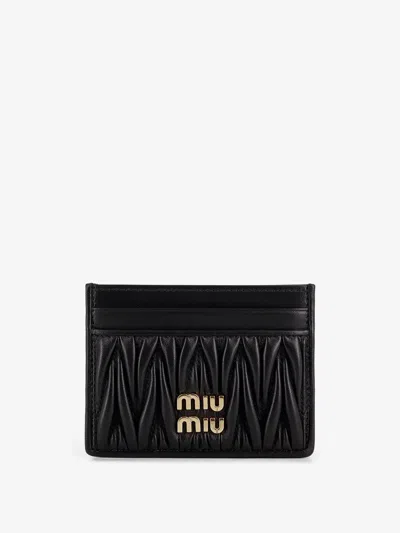Miu Miu Quilted Leather Card Holder With Metal Lettering Logo In Black