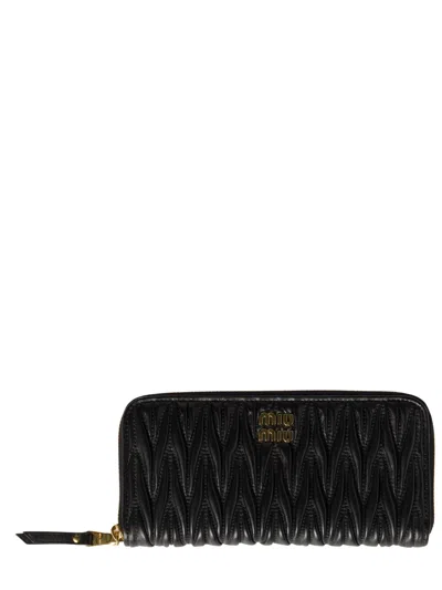 Miu Miu Quilted Leather Large Wallet With Coin Zip Pocket And Metallic Logo In Black
