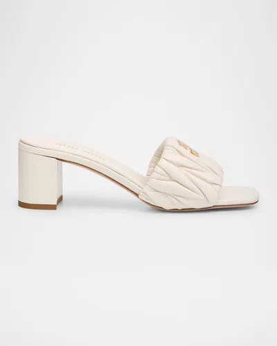 MIU MIU QUILTED LEATHER MULE SANDALS