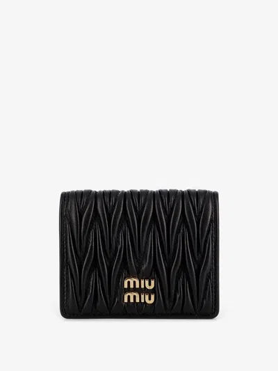 Miu Miu Quilted Leather Wallet In Black