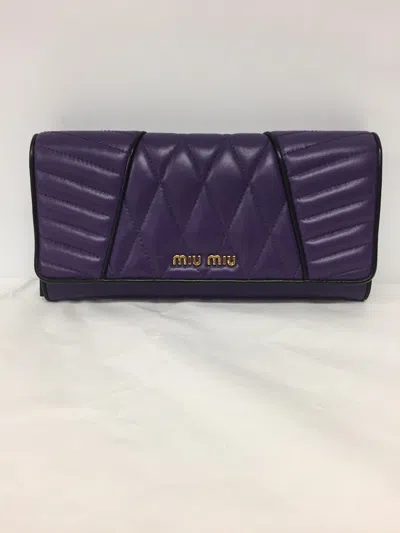 Miu Miu Quilted Leather Wallet In Purple