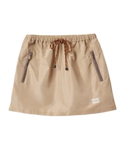 Miu Miu Raised-logo A-line Miniskirt In Nude
