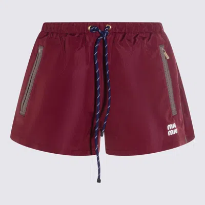 MIU MIU RED SHORTS