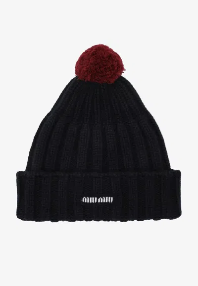 Miu Miu Ribbed Cashmere Pom-pom Beanie In Black