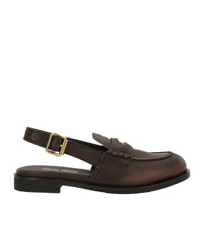 Miu Miu Round-toe Slingback Loafers In Black