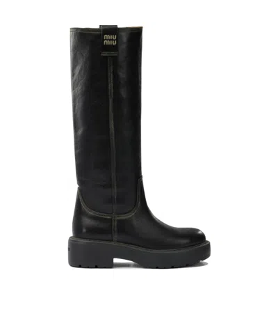 Miu Miu Round-toed Boots In Black