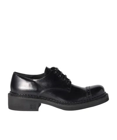 Miu Miu Round-toe Brogues In Black
