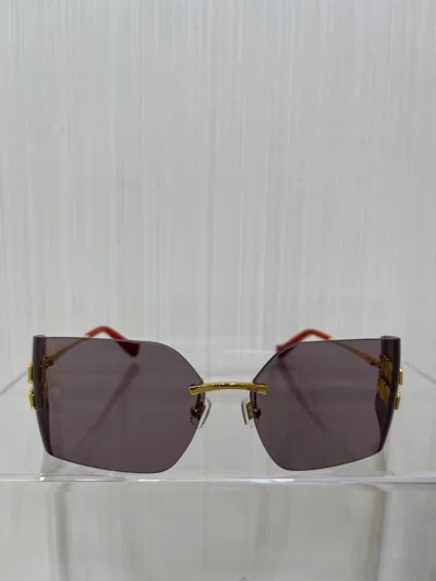 Pre-owned Miu Miu Runway Rimless Curved Lens Sunglasses With Gold Frame And Logo Detail In Лиловый