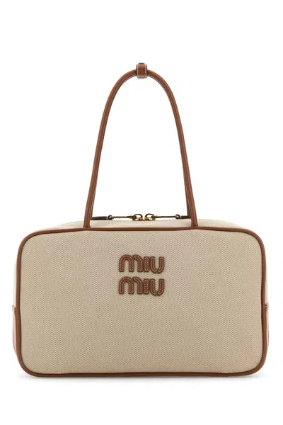 Miu Miu Sand Canvas Shoulder Bag In Brown