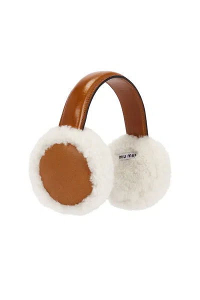 Miu Miu Shearling Earmuffs In Brown