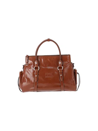 Miu Miu Shiny Leather Handbag In Brown