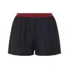 Miu Miu Virgin Wool Pinstriped Shorts In Black