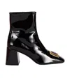 Miu Miu Side Zipper Boots In Black