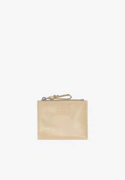 Miu Miu Small Leather Zip Wallet In Beige
