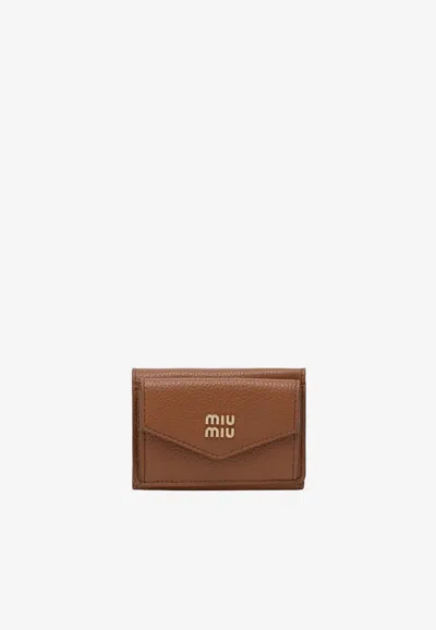Miu Miu Small Logo Lettering Wallet In Cognac