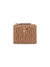 Miu Miu Matelassé Leather Logo Zip Cardholder In Brown