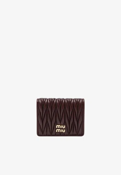 Miu Miu Small Matelassé Leather Logo Wallet In Burgundy