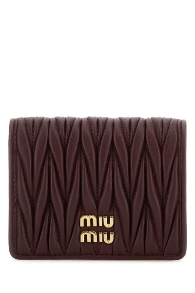 Miu Miu Small Matelassé Nappa Leather Wallet With Snap Closure In Blue