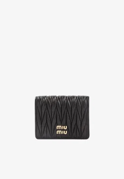 Miu Miu Small Matelassé Nappa Leather Wallet In Brown