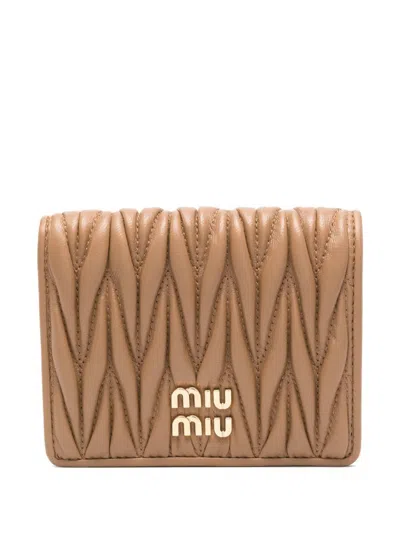 Miu Miu Logo-plaque Matelassé Leather Wallet In Brown