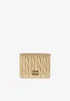 Miu Miu Small Matelass Wallet In Cream
