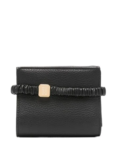 Miu Miu Small Tri-fold Leather Wallet In Black