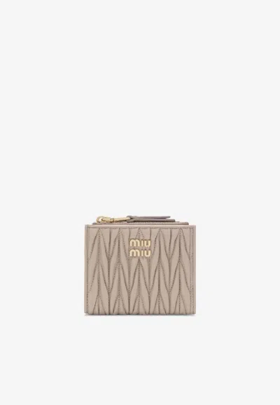 Miu Miu Small Wallet In Matelassé Nappa In Black