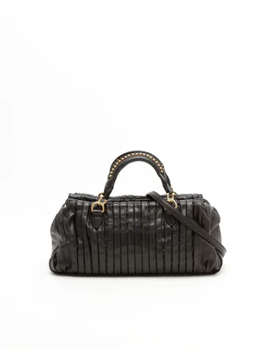 Miu Miu Studded Matelassé Bag In Black