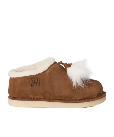 Miu Miu Suede And Shearling Mules In Brown