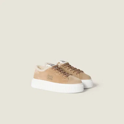MIU MIU SUEDE AND SHEARLING SNEAKERS