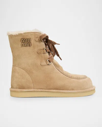 Miu Miu Suede Shearling-lined Ankle Boots In Brown