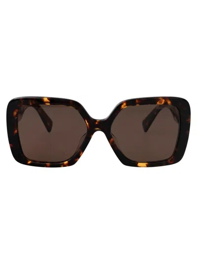 Miu Miu Sunglasses In Brown