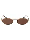Miu Miu Metal Oval Sunglasses In Brown