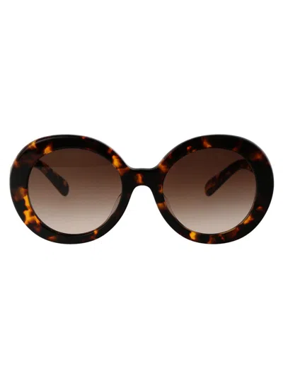 Miu Miu Sunglasses In Vau6s1 Honey Havana