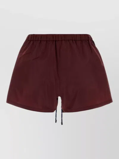 Miu Miu Tailored Shorts Featuring Functional Side Pockets In Brown