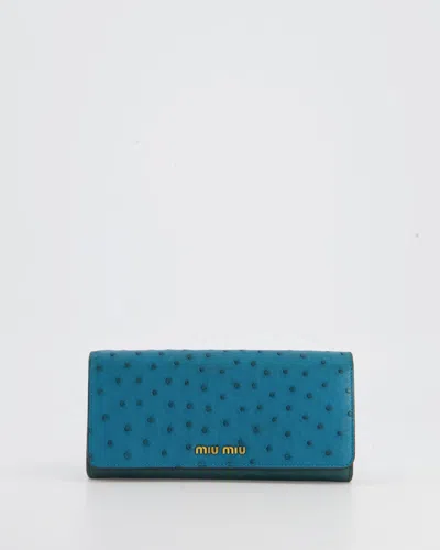 Miu Miu Teal Ostrich Long-line Wallet With Gold Hardware In Blue