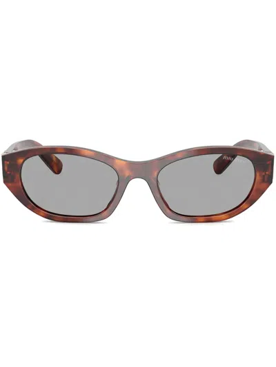 Miu Miu Tortoiseshell Sunglasses In Brown
